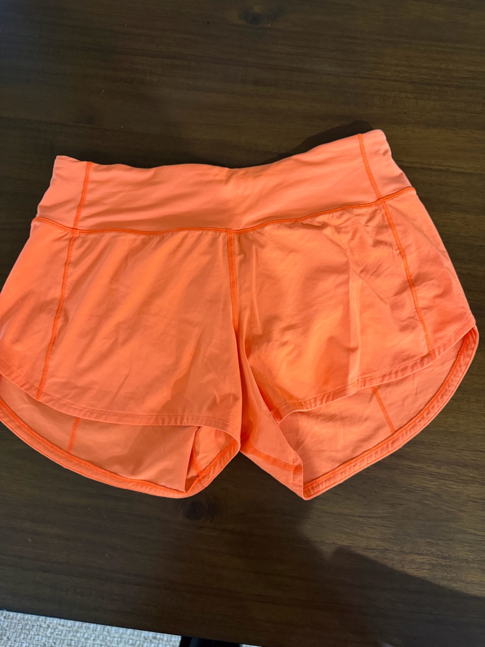 Women’s LULULEMON Orange athletic shorts